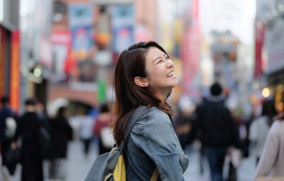 Portrait of woman on the center street of Shibuya, Tokyo